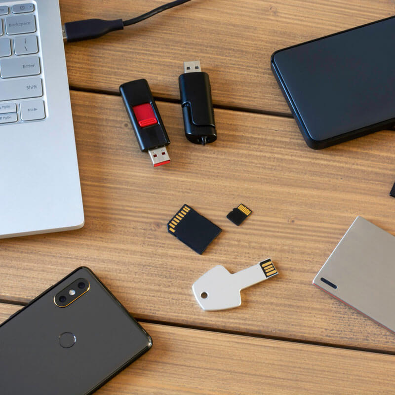 various electronic devices on table top